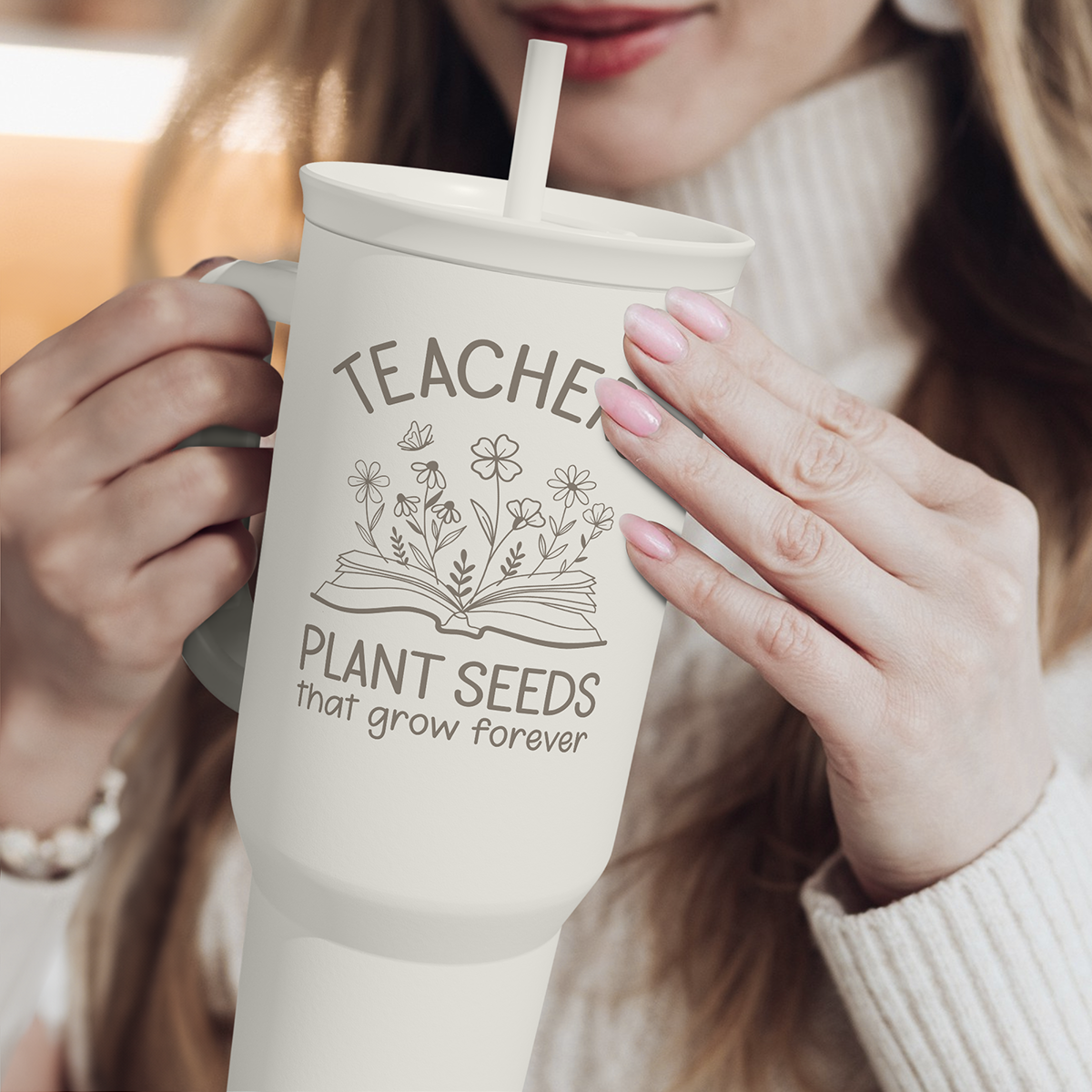 White 40oz tumbler with handle and straw, TEACHER plant seeds graphic
