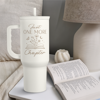 40oz white tumbler with book-themed print, straw lid and side handle